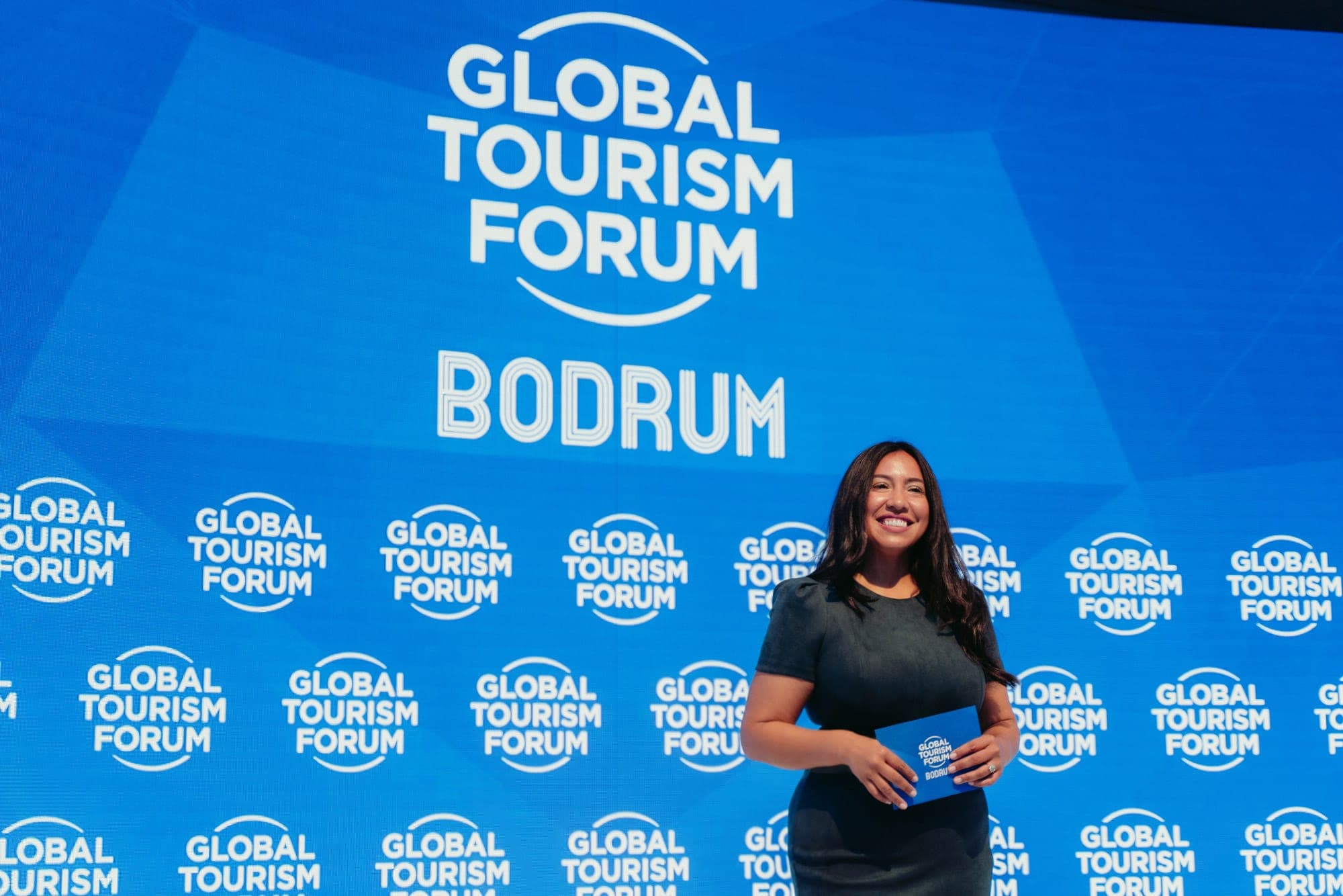 Jeannette Ceja hosting on stage at the Global Tourism Forum