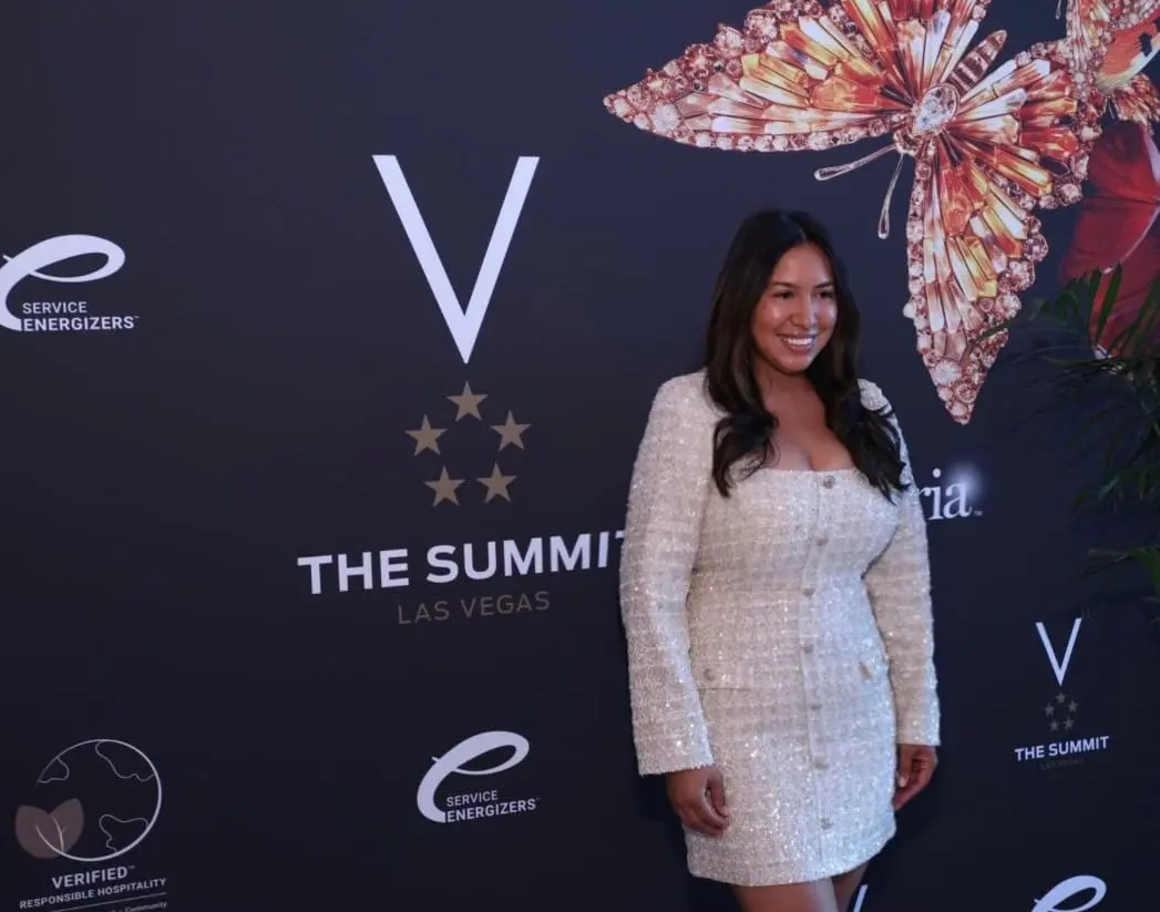 Jeannette Ceja emceeing the Forbes Travel Guide Summit
