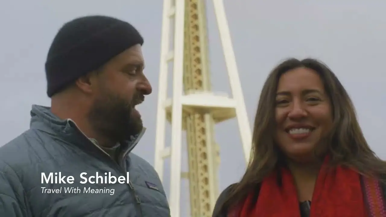 Jeannette Ceja with Mike Schibel of Travel With Meaning at the Space Needle